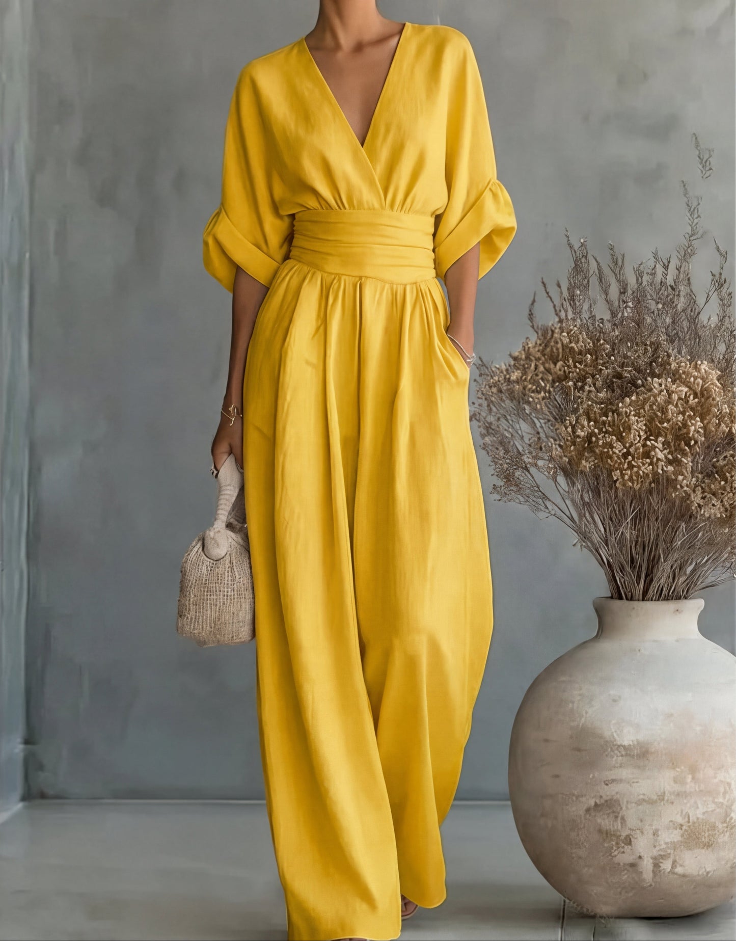 Belkis - Stylish jumpsuit with a V-neck and wide-leg pants