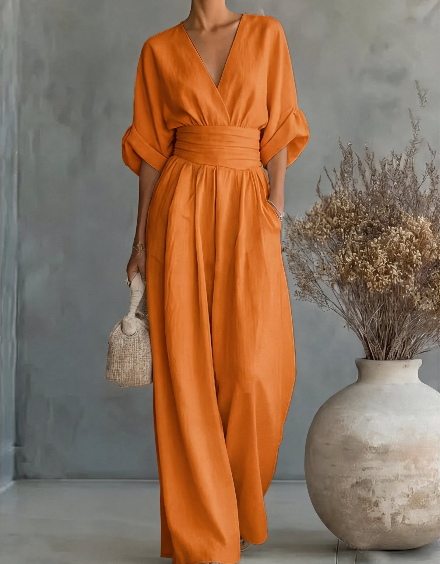 Belkis - Stylish jumpsuit with a V-neck and wide-leg pants